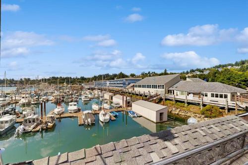 Historic Bayfront House | Second Floor Condo with Marina View High-Speed WiFi Water View and Balcony