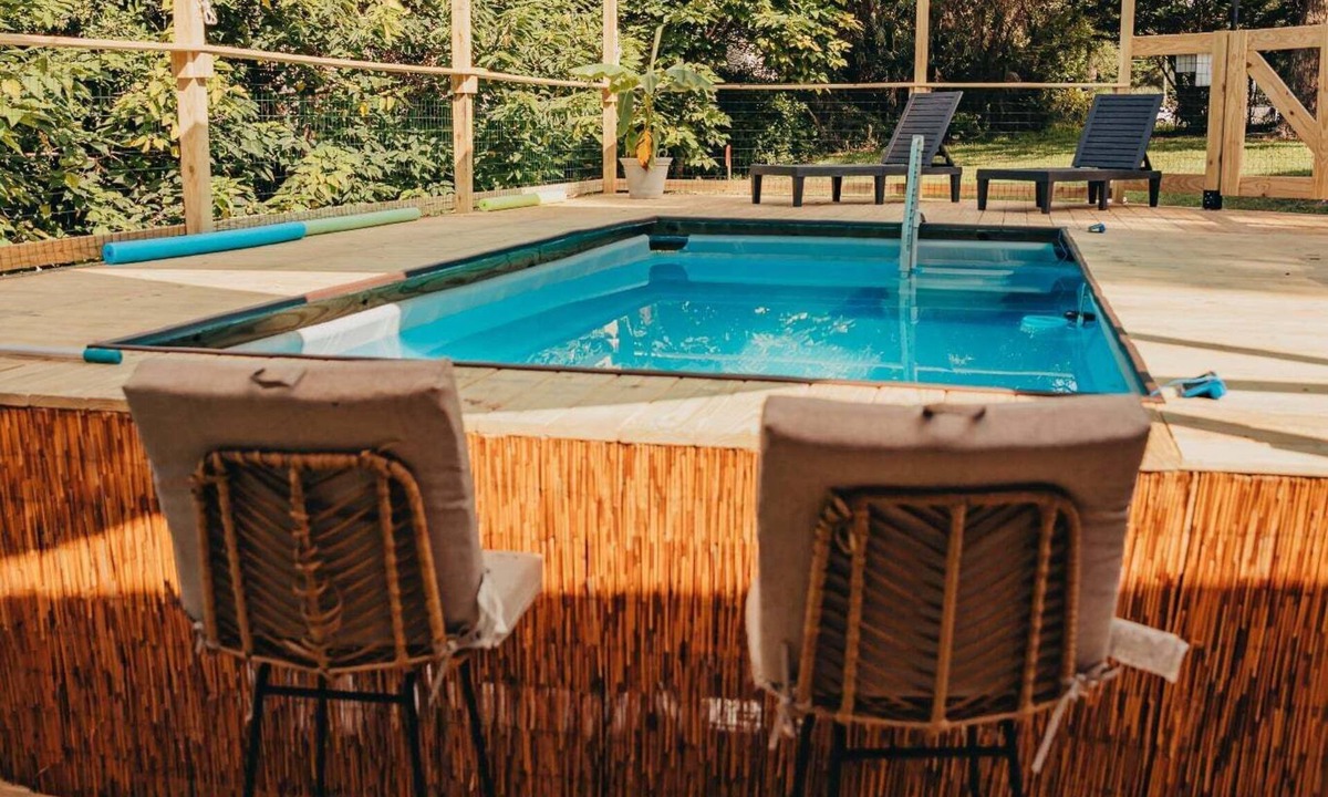 Little River House | Tropical Large 3 Bedroom Pool Home in Little River minutes to beaches sleeps 9