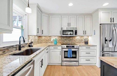 Wilmington House | 4 bedroom 3 bath with tranquil saltwater pool oasis! Sleeps up to 12