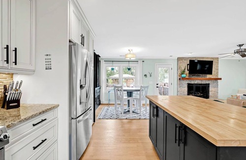 Wilmington House | 4 bedroom 3 bath with tranquil saltwater pool oasis! Sleeps up to 12