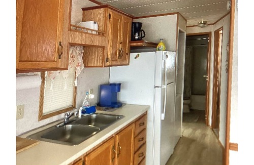 Assateague Pointe House | ASSATEAGUE POINTE Cottage-“Best Location” slp 6–Porch.sunrm 2Pools,private pier