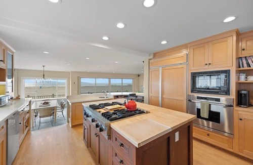 Hollywood Beach House | Beachfront abode with spacious deck, pool table, gas grill, smart TVs, & W/D