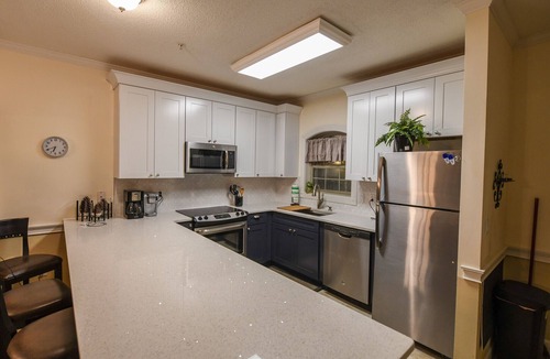 Central Myrtle Beach Condo | Beautiful private end unit! Featuring 2b/2b near swimming pool.