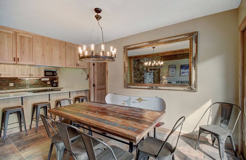 East Village at Copper Condo | Beautiful Ski Chalet with hot tub. 1 Minute to Super Bee Lift! AN203