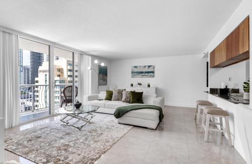 East Little Havana Apartment | Central 2 bed Apartment with a Pool & Gym- Free Garage Parking