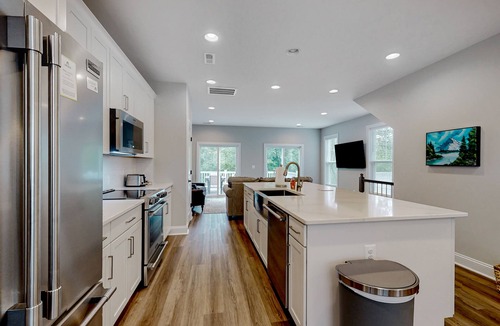 Mineral House | Charming lakefront retreat with game room and covered dock access