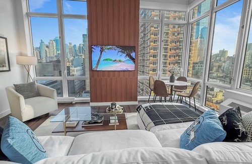 Midtown West Apartment | Corner Skyline Living 1BR with Floor to Ceiling Views Walk to Times Square