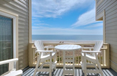 Caswell Beach Condo | Discover oceanfront bliss at OIBV 202 in Oak Island, featuring 3 bedrooms and stunning views.