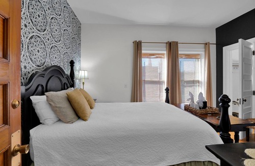 Olean Bed & Breakfast | Elegant Decor, Plush Bedding! Maya Angelou Room