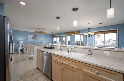 Rehoboth by the Sea Condo | HEART OF DEWEY BEACH- STEPS TO THE BEACH - 4 BR, 2 1/2 BA - IZZY PLAZA
