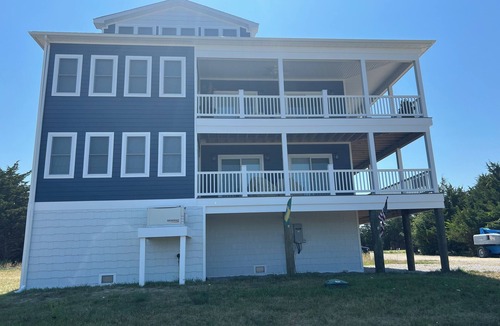 Milford House | Hidden Gem, Relax,Water Views, Covered Deck Breezes Elevator &HotTub&Turf Fields