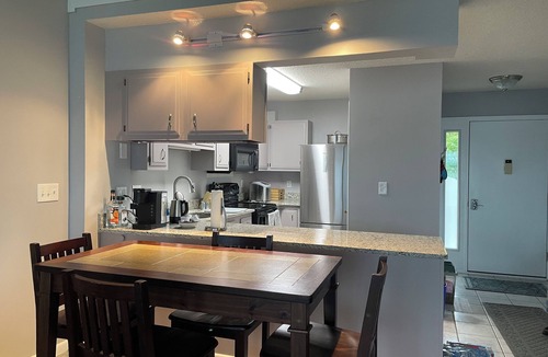 Dewittville Condo | Lakefront condo with pool, tennis and pickleball