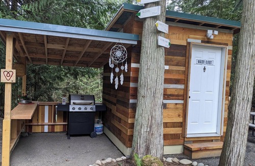 Sequim RV Rental | Lavender Glamping Tent with heater , mini fridge and fire pit.