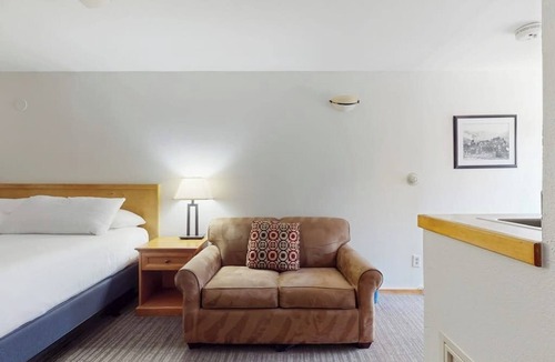 West End Cabin | Main St. gem - pool & hot tub - walk to lifts, dog-friendly, private balcony