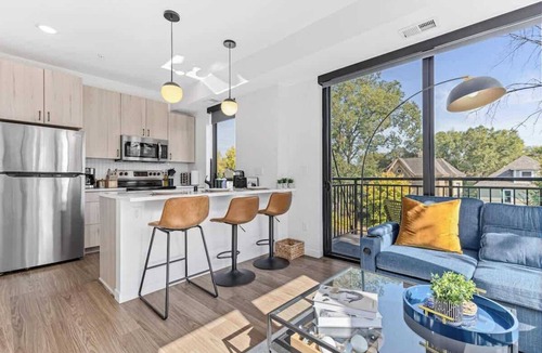 St. Anthony West Apartment | Modern Apt with Rooftop & Skyline Views