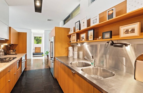 Springs House | Modern home sited on a lush wood acre, stunning pool, covered deck, outdoor.