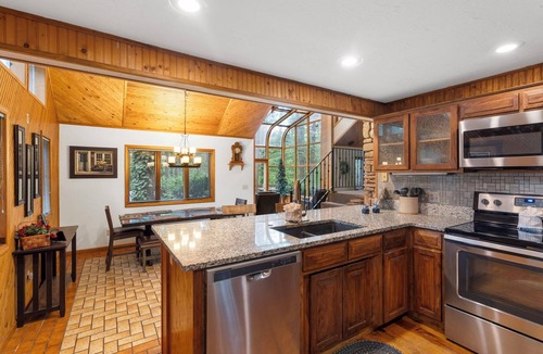Blue Eye House | Private 40-Acre Tall Pines Sanctuary with Hot Tub, Game Table, Car Charger & Community Pool