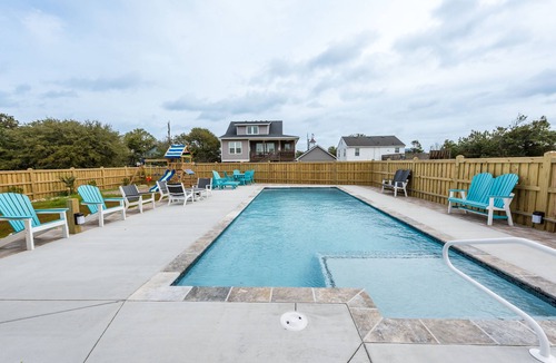 Kill Devil Hills Apartment | PRIVATE King Suite, POOL, GRILL,outdoor shower,coffee bar,fridge,microwave