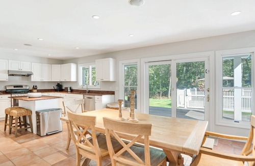 Tuckahoe House | Resort-style Southampton retreat with heated pool, chic interiors, and.