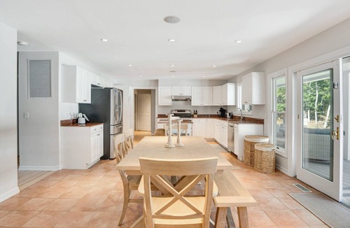 Tuckahoe House | Resort-style Southampton retreat with heated pool, chic interiors, and.