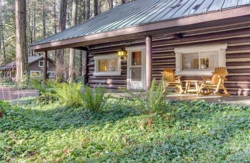 McKenzie Bridge House | Restored log cabin with classic porch - near river trails hot springs & more