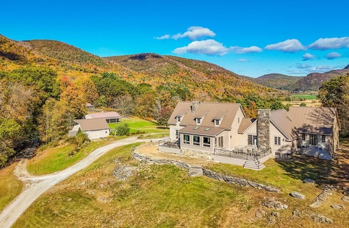 Pawlet House | Riverfront estate, mountain views, dog-friendly, fireplace, balcony, w/d, wifi