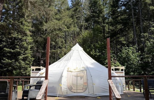 Leland RV Rental | Rustic-Chic Bell Tent with Forest Retreat Amenities Near Wolf Creek, Oregon