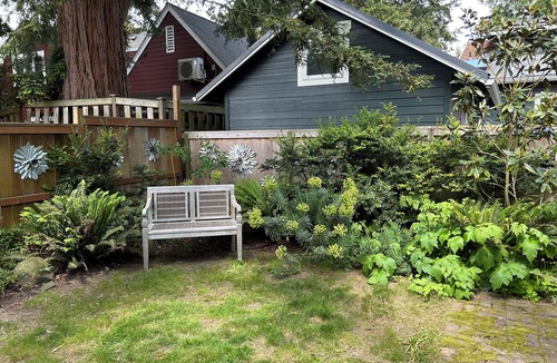 North Admiral Cottage | Secret garden cottage studio retreat in Seattle's beachside neighborhood.