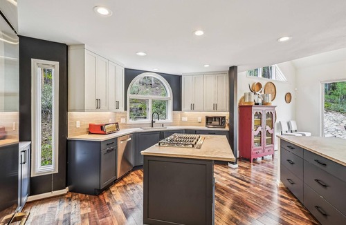 Dunkin Hill House | Stormbunker Paradise: Spacious home with stunning wooded views & hot hub!