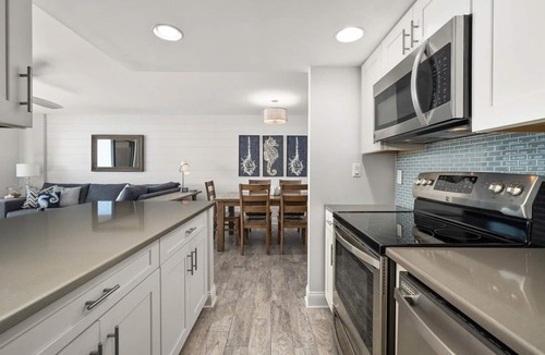 Bethany Beach Condo | Stunning Sea Colony Oceanfront Condo just steps to the sand and pools!