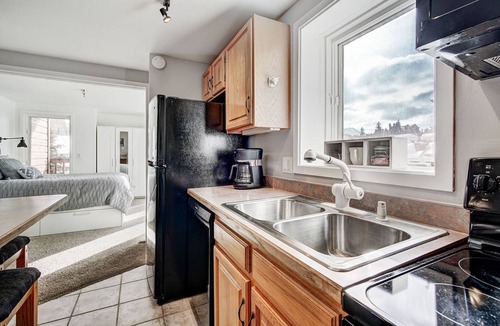 Four O'Clock Condo | Super cute studio right across the street from the Snowflake Chair Lift!