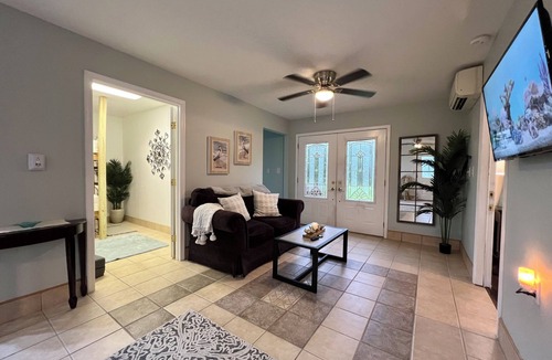 Achilles House | Waterfront Home with stunning views & Hot tub- rent Golf Cart/Kayak/Boat