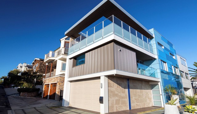 Bring the Group or large family to this 7 bedroom/7 bath home in Manhattan Beach