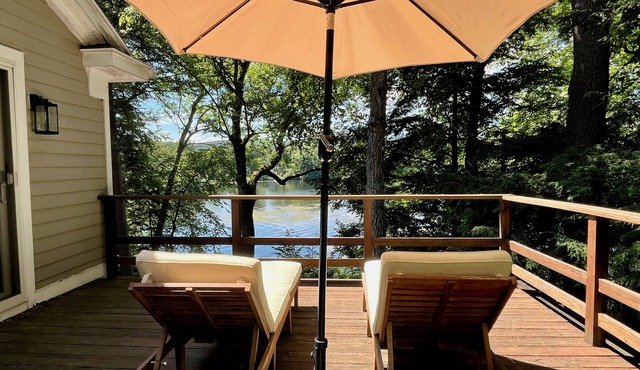 Charming Lakefront Retreat Nestled Among Trees