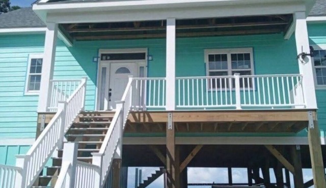 Come RELAX at our brand new bay front 3-bedroom home in charming Cedar Island.