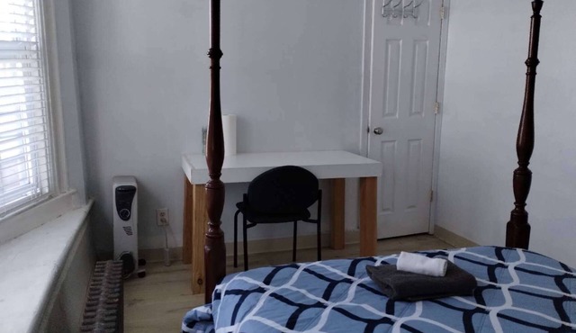 Cozy private bedroom with shared bathroom in charming Yonkers with AC