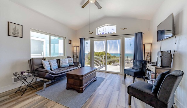 Dog-friendly oceanside home w/WiFi, ocean views, private W/D, deck, & fireplace