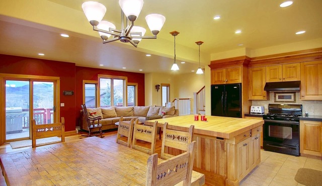 Dog-Friendly Mountain Escape | Fenced Patio, Epic Views, Garage, Steps to Trails & Free Town Bus
