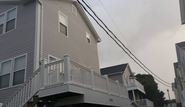 Family‑Friendly Ocean‑View Home 4BR/3BA Steps to Beach Sleeps 8‑10