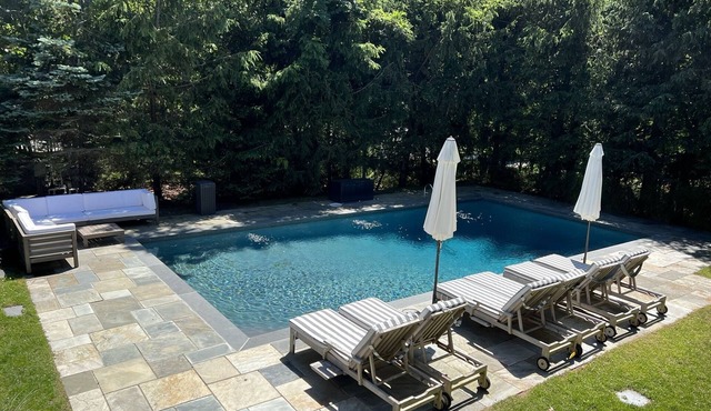Hamptons home with heated pool.