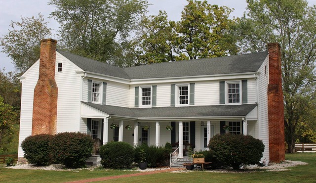 Historical 4-bedroom, 3-bathroom farmhouse comfortably sleeps up to 8 guests