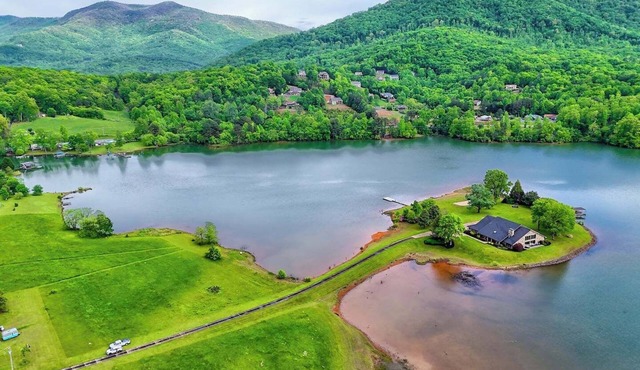 Lake Haven on Chatuge by Chatuge Home Concierge | Indoor Pool · Covered Boat Slip · Swim Dock · Hot Tub · Firepit · Sand Volleyball · Kayaks