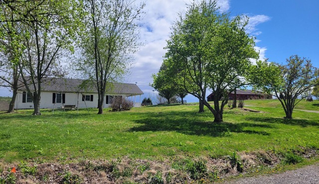 Lovely 2-bedroom farmhouse with central heat/AC in a quiet country setting.
