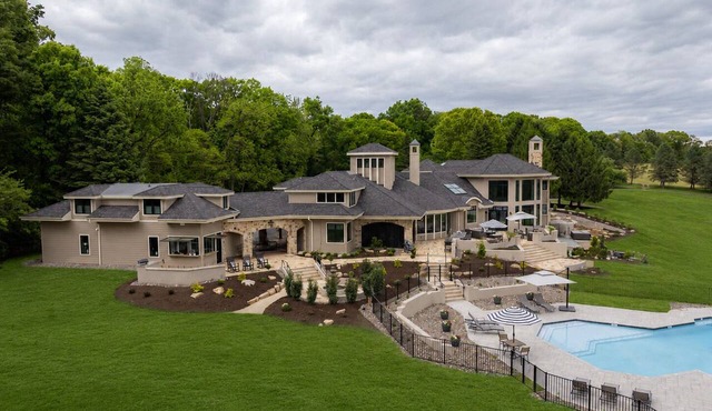 Overlook Retreat Villa is a luxury private estate on 100 scenic acres for up to 18 guests. Enjoy a pool, hot tub, game room, sports court, and sweeping sunset views that make you stop mid-sentence and create lasting memories!