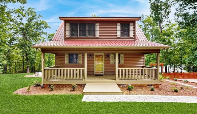 Private lakefront hideaway with dock, swing bench, remote work desk, & AC