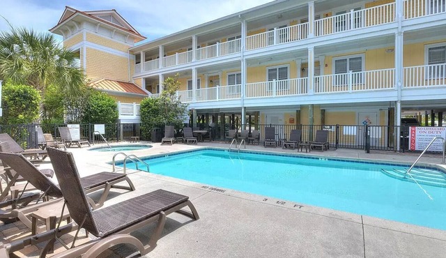 Second Row Condo with Ocean Views, Pool, and Hot tub