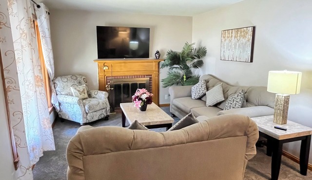 Spacious 3 level 4-bedroom house- 2 Full kitchens-2 king beds and 3 queen beds.