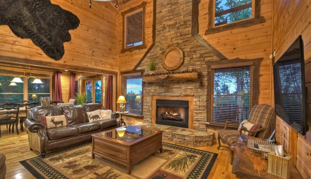 Stunning forested views, hot tub, fire pit, pool table!