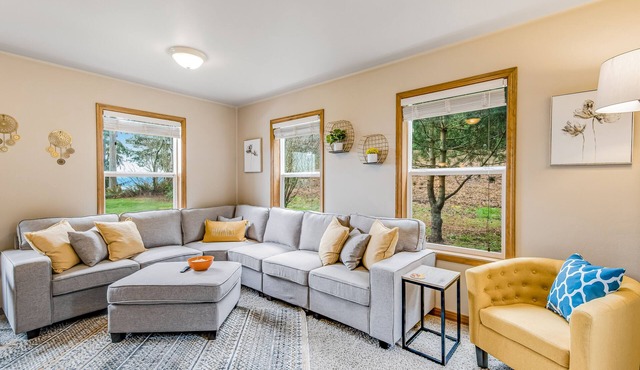 Stunning waterfront getaway with firepit, woodstove, & scenic deck