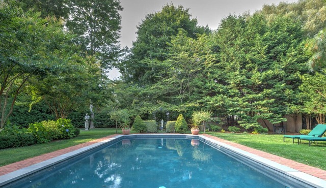 Two Master Suites, Eat-In Kitchen with Breakfast Area, Den with Fireplace,.